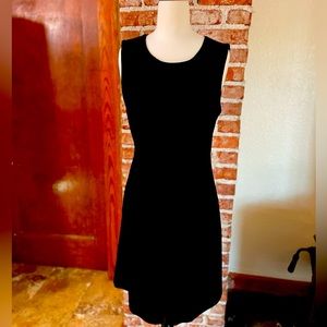 Black dress with pockets and good zippers on either side.